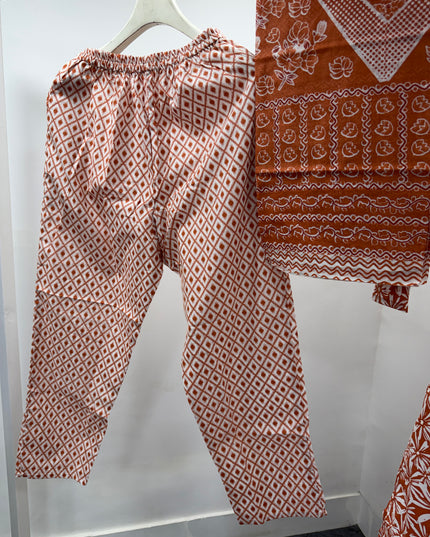 LADIES KURTI SET CODE-A120 Women's Rust Orange Floral Printed Cotton Kurta Pant Dupatta Set with Embroidered Neck