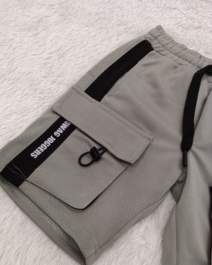 BOYS SHORT CODE-A138 Boys Premium Cargo Shorts with Utility Pockets – Grey & Pista
