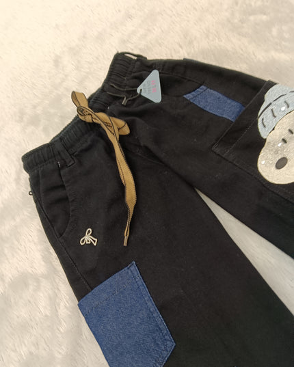 GIRLS JEANS CODE-A217 Girls Black Wide Leg Patch Pocket Cotton Pants with Snoopy Print | Stylish Casual Bottoms for Kids | He And She